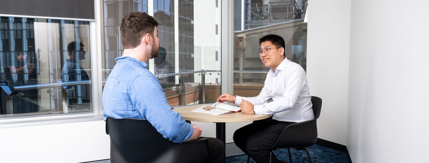 two-males-discussing