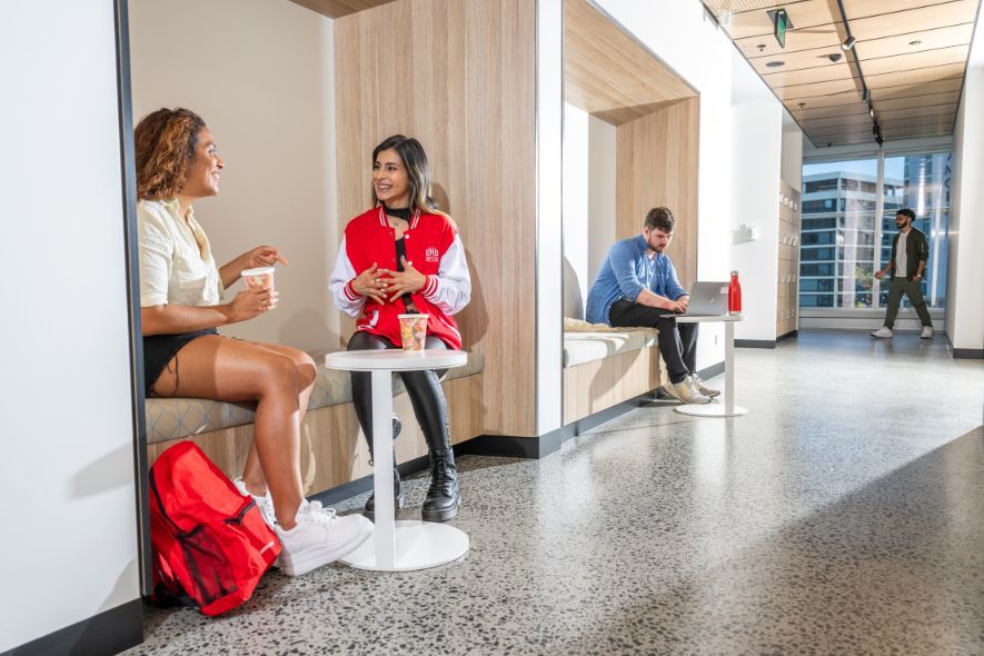 Female student sitting and talking