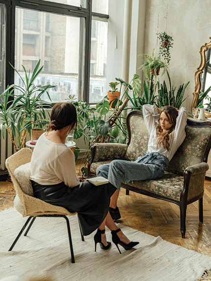 Two female student sitting