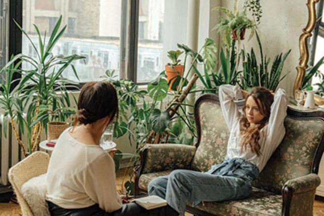 Two female student sitting