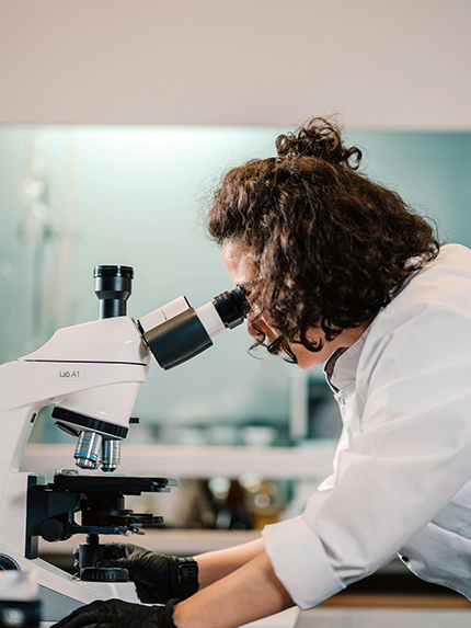 Medical student watching in the telescope