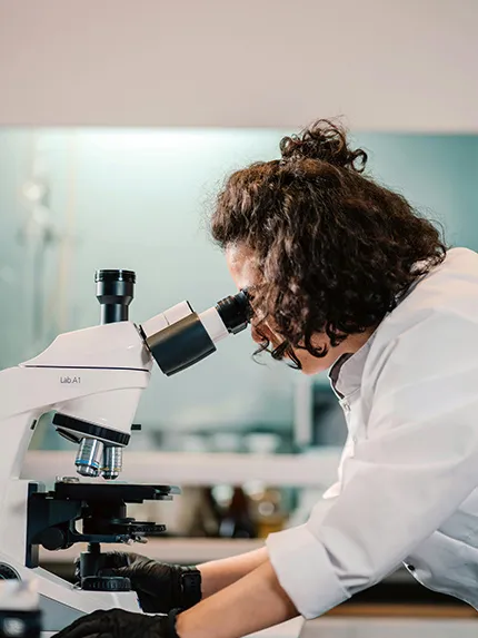 Medical student watching in the telescope