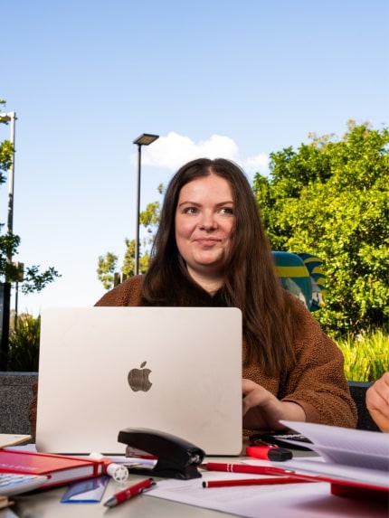 Female student working on laptop