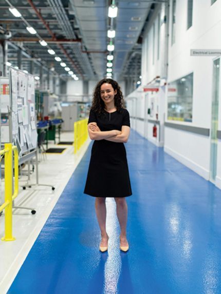 Female student standing in the engineering lab