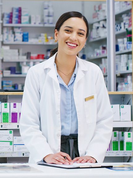 Student nurse smiling in the medical store