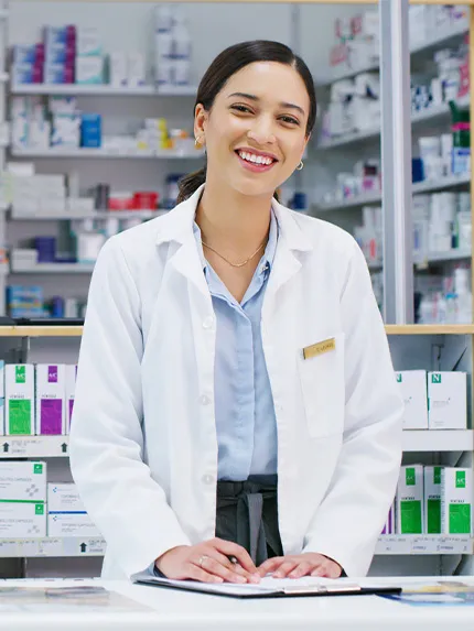 Student nurse smiling in the medical store