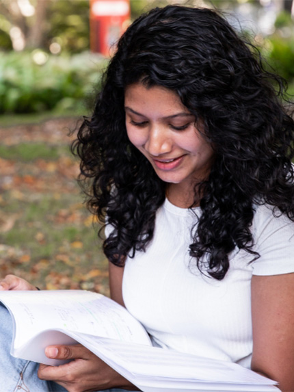 Female student Brisbane city park studying
