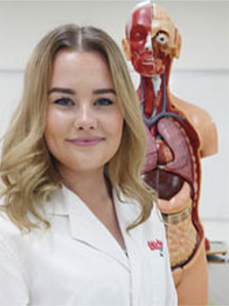Female student health sciences classroom