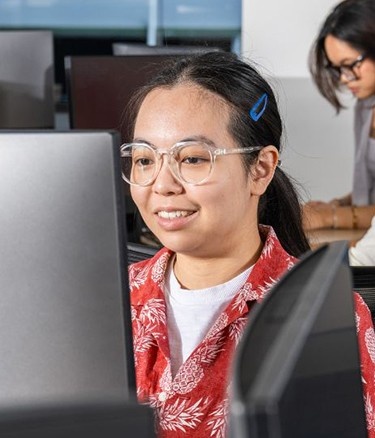 Female student working on laptop