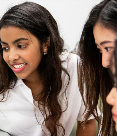 Female students group studying iPad