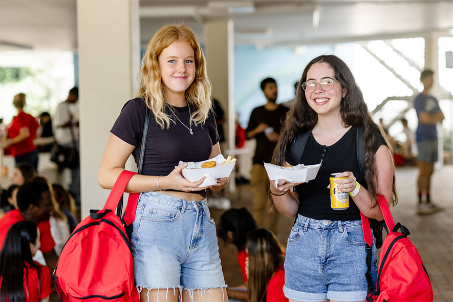 Female students standing in canteen
