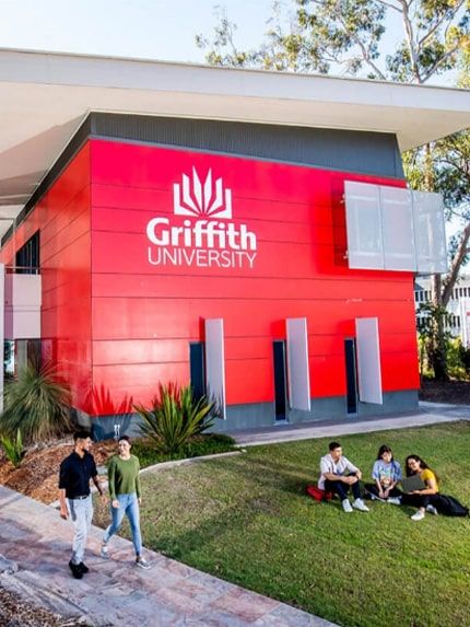 Student walking in campus ground