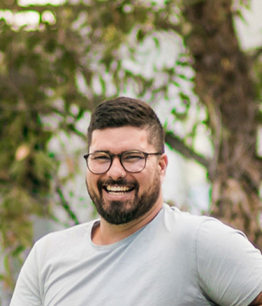 Mature age student outside happy