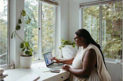 Female student working on laptop