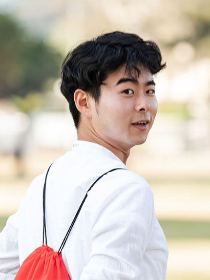 Student red backpack outside