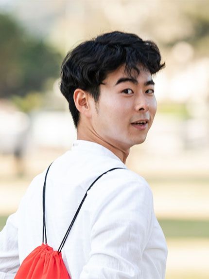 Student red backpack outside