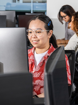 Student studying working computer