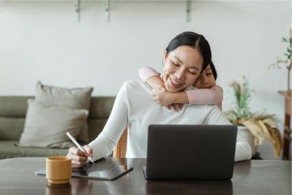 Student studying with child