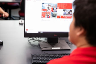 Student using computer student portal