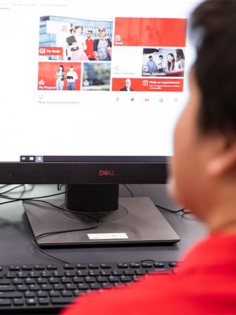 Student using computer student portal