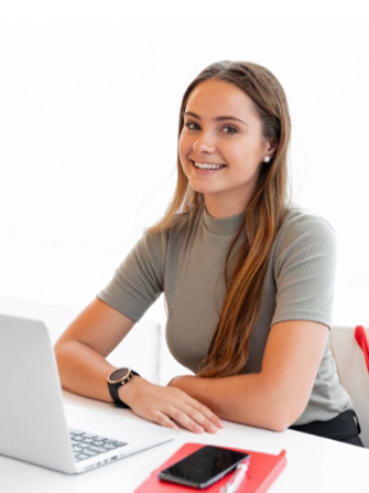 Student working inside on laptop