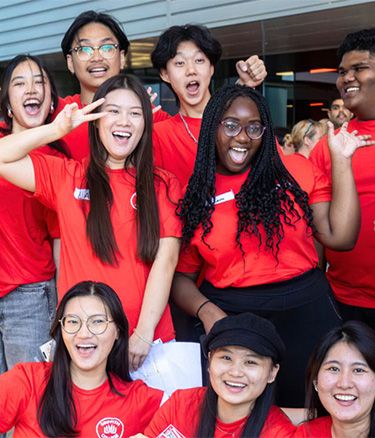 Students group in red dress