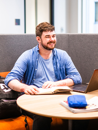 Students sitting around the table and talking