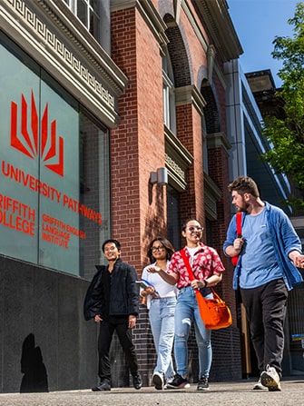 Students walking on the road outside GC college